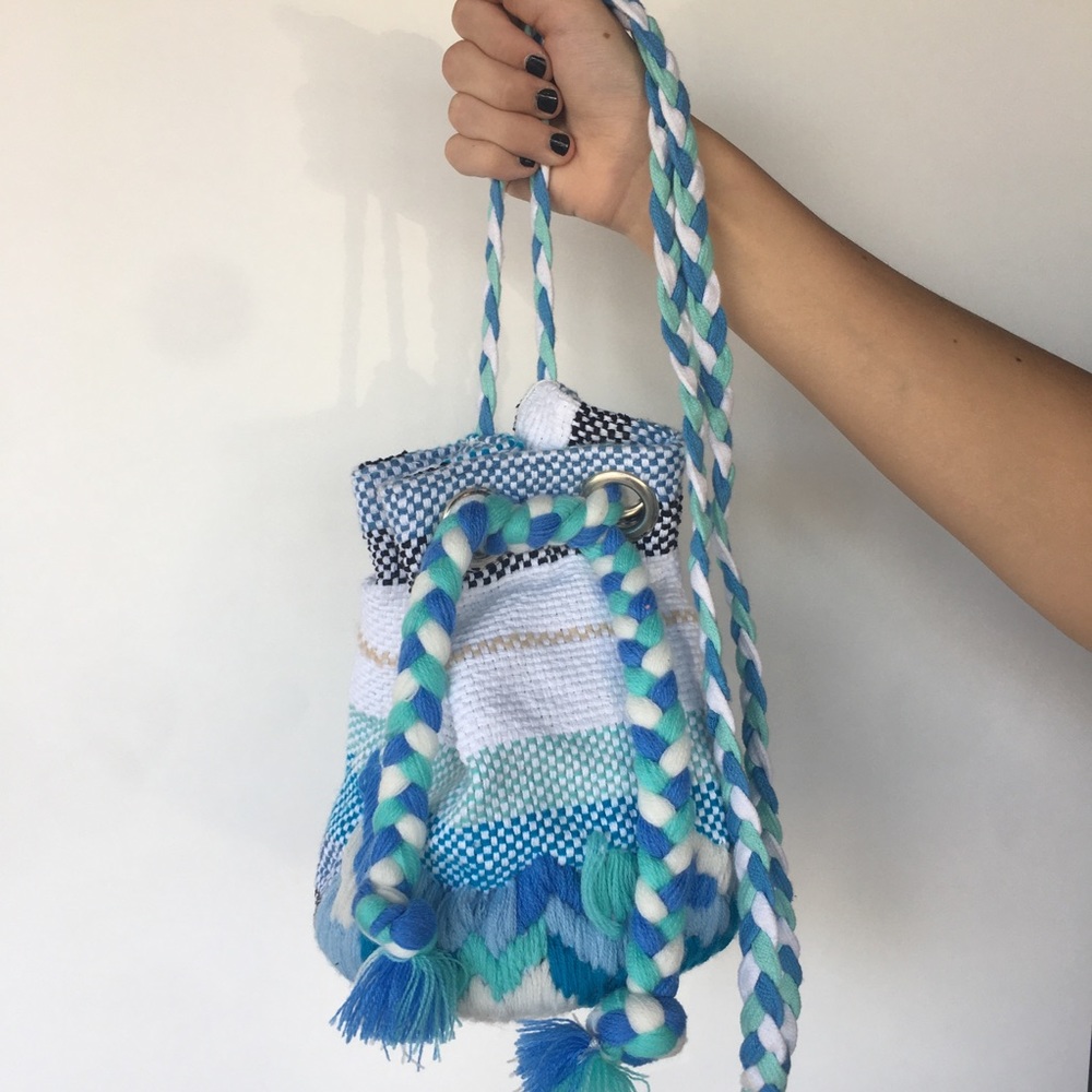 America and Beyond cross body bucket bag | $58